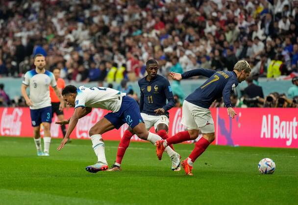 Mandatory Credit: Photo by Dave Shopland Shutterstock (13655765ap) Antoine Griezmann of France wins the ball off Jude Bellingham of England England v France, FIFA World Cup, WM, Weltmeisterschaft, Fussball 2022, Quarter Final, Football, Al Bayt Stadium, Al Khor, Qatar - 10 Dec 2022 Editorial Use Only England v France, FIFA World Cup 2022, Quarter Final, Football, Al Bayt Stadium, Al Khor, Qatar - 10 Dec 2022 Editorial Use Only Copyright: xDavexShopland Shutterstockx 13655765ap