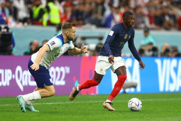 Mandatory Credit: Photo by Kieran McManus Shutterstock (13655770au) Luke Shaw of England and Ousmane Dembele of France England v France, FIFA World Cup, WM, Weltmeisterschaft, Fussball 2022, Quarter Final, Football, Al Bayt Stadium, Al Khor, Qatar - 10 Dec 2022 Editorial Use Only England v France, FIFA World Cup 2022, Quarter Final, Football, Al Bayt Stadium, Al Khor, Qatar - 10 Dec 2022 Editorial Use Only Copyright: xKieranxMcManus Shutterstockx 13655770au