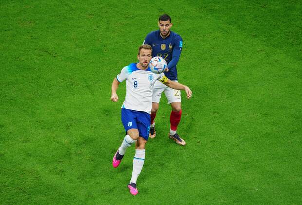 Mandatory Credit: Photo by Javier Garcia Shutterstock (13655768ag) Harry Kane of England in action under pressure from Theo Hernandez of France England v France, FIFA World Cup, WM, Weltmeisterschaft, Fussball 2022, Quarter Final, Football, Al Bayt Stadium, Al Khor, Qatar - 10 Dec 2022 Editorial Use Only England v France, FIFA World Cup 2022, Quarter Final, Football, Al Bayt Stadium, Al Khor, Qatar - 10 Dec 2022 Editorial Use Only Copyright: xJavierxGarcia Shutterstockx 13655768ag