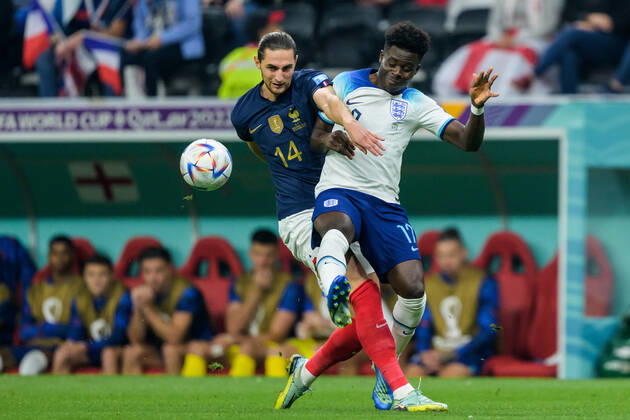 221210 Adrien Rabiot of France and Bukayo Saka of England during the FIFA World Cup 2022 quarterfinal between England and France on December 10, 2022 in Doha Photo Joel Marklund BILDBYRAN code JM JM0409 bbeng football football soccer fotball world cup football world cup football world cup 2022 fifa world cup 2022 quarter final quarter final quarter final england france france,  Copyright: JOELxMARKLUND BB221210JM028