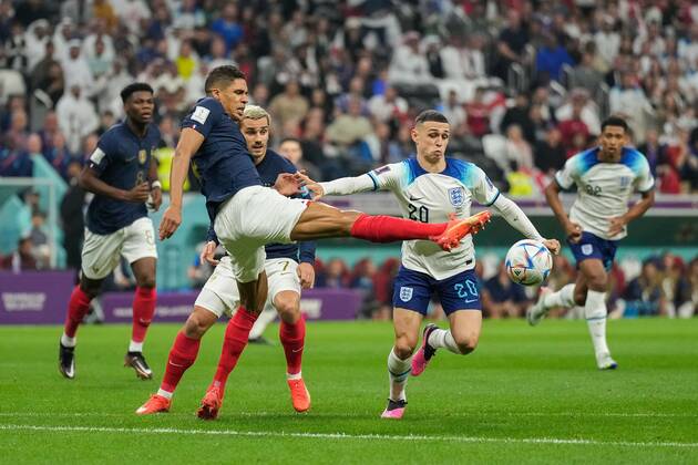 Mandatory Credit: Photo by Dave Shopland Shutterstock (13655765at) Raphael Varane of France challenges Phil Foden of England England v France, FIFA World Cup, WM, Weltmeisterschaft, Fussball 2022, Quarter Final, Football, Al Bayt Stadium, Al Khor, Qatar - 10 Dec 2022 Editorial Use Only England v France, FIFA World Cup 2022, Quarter Final, Football, Al Bayt Stadium, Al Khor, Qatar - 10 Dec 2022 Editorial Use Only Copyright: xDavexShopland Shutterstockx 13655765at
