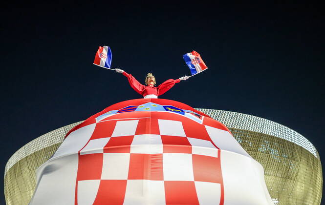 QATAR, LUSAIL - DECEMBER 13, 2022: A fan of Croatia is pictured ahead of the 2022 FIFA World Cup, WM, Weltmeisterschaft, Fussball semifinal football match between Argentina and Croatia at Lusail Iconic Stadium. Sergei Bobylev TASS  56400490