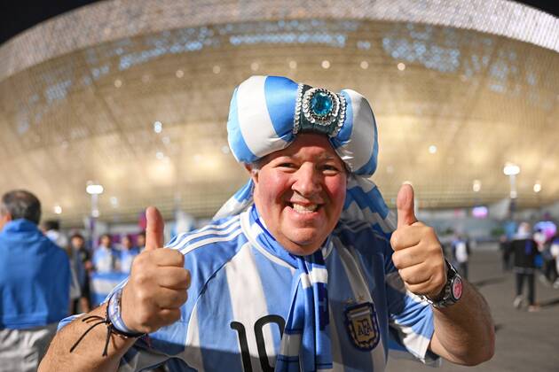 Qatar Soccer World Cup Argentina - Croatia 8338483 13.12.2022 An Argentina s fan poses for a photo before the Qatar 2022 World Cup semi-final match between Argentina and Croatia at the Lusail Iconic Stadium, in Lusail, Qatar. Grigory Sysoev Sputnik Lusail Qatar  Copyright: xGrigoryxSysoevx