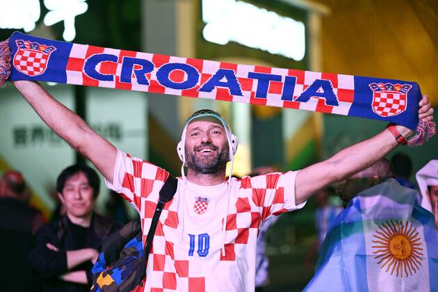 Qatar Soccer World Cup Argentina - Croatia 8338485 13.12.2022 A Croatia s fan poses for a photo before the Qatar 2022 World Cup semi-final match between Argentina and Croatia at the Lusail Iconic Stadium, in Lusail, Qatar. Grigory Sysoev Sputnik Lusail Qatar  Copyright: xGrigoryxSysoevx