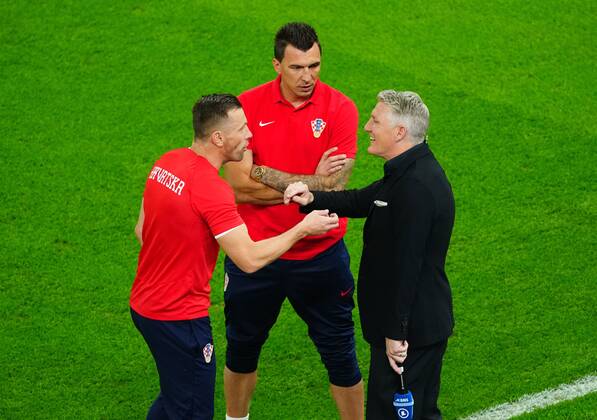 Mandatory Credit: Photo by Javier Garcia Shutterstock (13661834m) Bastian Schweinsteiger talks with Croatian Coaches Ivica Olic and Mario Mandzukic, who all played at Bayern Munich at around the same time. Argentina v Croatia, FIFA World Cup, WM, Weltmeisterschaft, Fussball 2022, Semi Final, Football, Lusail Stadium, Al Daayen, Qatar - 13 Dec 2022 Editorial Use Only Argentina v Croatia, FIFA World Cup 2022, Semi Final, Football, Lusail Stadium, Al Daayen, Qatar - 13 Dec 2022 Editorial Use Only  Copyright: xJavierxGarcia Shutterstockx 13661834m