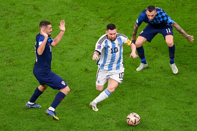 FOOTBALL World Cup 2022 Semifinal Argentina Croatia 13 12 2022 Mateo Kovacic Croatia left , Lionel Messi Argentina center and Marcelo Brozovic Croatia