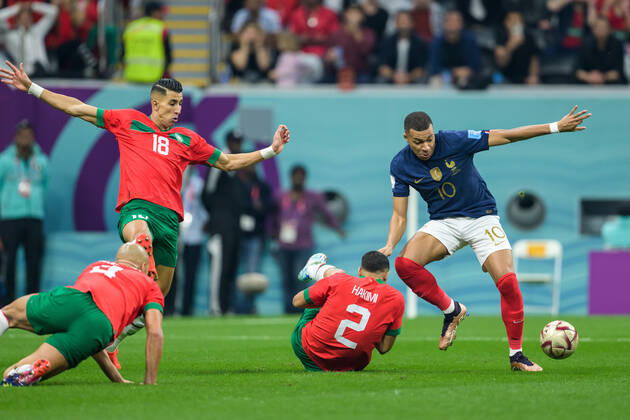 221214 Sofyan Amrabat, Jawad El Yamiq and Achraf Hakimi of Morocco against Kylian Mbappe of France during the FIFA World Cup 2022 semifinal between France and Morocco on December 14, 2022 in Doha Photo Joel Marklund BILDBYRAN code JM JM0412 bbeng football football soccer football world cup football world cup football world cup 2022 fifa world cup 2022 semi final semi final france france morocco morocco,  Copyright: JOELxMARKLUND BB221214JM030