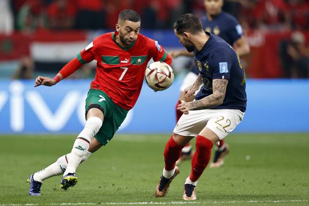 AL KHOR l r Hakim Ziyech of Morocco, Theo Hernandez of France during the FIFA World Cup Qatar 2022 Semifinal match between France and Morocco at Al Bayt Stadium on December 14, 2022 in Al Khor, Qatar AP Dutch Height MAURICE OF STONE FIFA World Cup Qatar 2022 2022 xVIxANPxSportx xMauricexvanxSteenxWKxIVx 459447354 originalFilename: 459447354