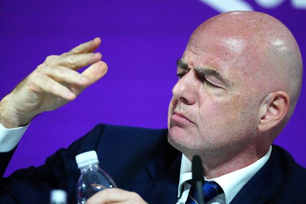 Mandatory Credit: Photo by Javier Garcia Shutterstock (13670212ca) FIFA President Gianni Infantino looks at a fly that distracts him during the press conference, PK, Pressekonferenz FIFA Press Conference, FIFA World Cup, WM, Weltmeisterschaft, Fussball 2022, Football, Qatar National Convention Centre, Doha, Qatar - 16 Dec 2022 Editorial Use Only FIFA Press Conference, FIFA World Cup 2022, Football, Qatar National Convention Centre, Doha, Qatar - 16 Dec 2022 Editorial Use Only Copyright: xJavierxGarcia Shutterstockx 13670212ca