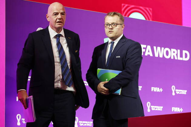 QATAR, DOHA - DECEMBER 16, 2022: FIFA President Gianni Infantino (L) and FIFA Director of Media Relations Bryan Swanson leave after a final press conference, PK, Pressekonferenz on the finishing 2022 FIFA World Cup, WM, Weltmeisterschaft, Fussball at the main media center. The 2022 FIFA World Cup takes place in Qatar from November 20 to December 18, 2022. Sergei Bobylev TASS  56446753
