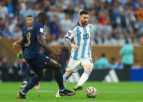 Mandatory Credit: Photo by Kieran McManus Shutterstock (13670809bd) Lionel Messi of Argentina and Dayot Upamecano of France Argentina v France, FIFA World Cup, WM, Weltmeisterschaft, Fussball 2022, Final, Football, Lusail Stadium, Al Daayen, Qatar - 18 Dec 2022 Editorial Use Only Argentina v France, FIFA World Cup 2022, Final, Football, Lusail Stadium, Al Daayen, Qatar - 18 Dec 2022 Editorial Use Only  Copyright: xKieranxMcManus Shutterstockx 13670809bd