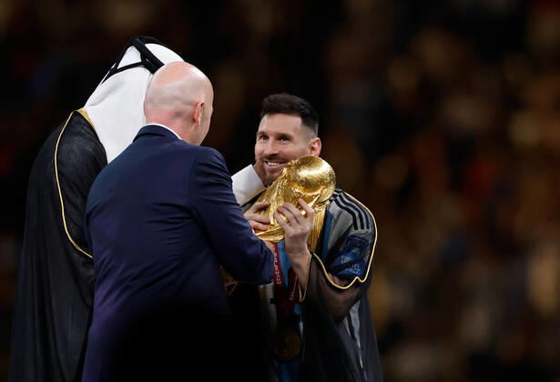 (221218) -- LUSAIL, Dec. 18, 2022 -- FIFA President Gianni Infantino (C) awards Lionel Messi of Argentina during the awarding ceremony of the 2022 FIFA World Cup, WM, Weltmeisterschaft, Fussball at Lusail Stadium in Lusail, Qatar, Dec. 18, 2022. ) (SP)QATAR-LUSAIL-2022 WORLD CUP-FINAL-ARG VS FRA WangxLili