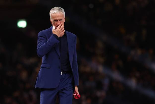 Doha, Qatar, 18th December 2022. Didier Deschamps coach of France dejected collects his losers medal during the FIFA World Cup, WM, Weltmeisterschaft, Fussball 2022 match at Lusail Stadium, Doha. Picture credit should read: David Klein Sportimage EDITORIAL USE ONLY. No use with unauthorised audio, video, data, fixture lists, club league logos or live services. Online in-match use limited to 120 images, no video emulation. No use in betting, games or single club league player publications. SPI-2101-0229