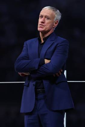 Doha, Qatar, 18th December 2022. Didier Deschamps coach of France dejected collects his losers medal during the FIFA World Cup, WM, Weltmeisterschaft, Fussball 2022 match at Lusail Stadium, Doha. Picture credit should read: David Klein Sportimage EDITORIAL USE ONLY. No use with unauthorised audio, video, data, fixture lists, club league logos or live services. Online in-match use limited to 120 images, no video emulation. No use in betting, games or single club league player publications. SPI-2101-0231