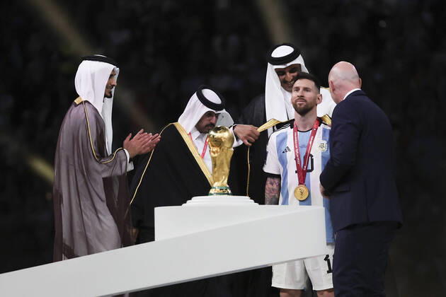 (221219) -- LUSAIL, Dec. 18, 2022 -- FIFA President Gianni Infantino (1st R) and the Emir of Qatar Sheikh Tamim bin Hamad Al Thani (3rd R) award Lionel Messi (2nd R) of Argentina during during the awarding ceremony of the 2022 FIFA World Cup, WM, Weltmeisterschaft, Fussball at Lusail Stadium in Lusail, Qatar, Dec. 18, 2022. ) (SP)QATAR-LUSAIL-2022 WORLD CUP-FINAL-ARG VS FRA CaoxCan