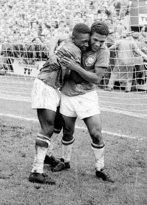 World Cup 1958 in Sweden Final Brazil Sweden 29 06 1958 in Stockholm Two-time goal scorer Pele lks is embraced by Garincha HM