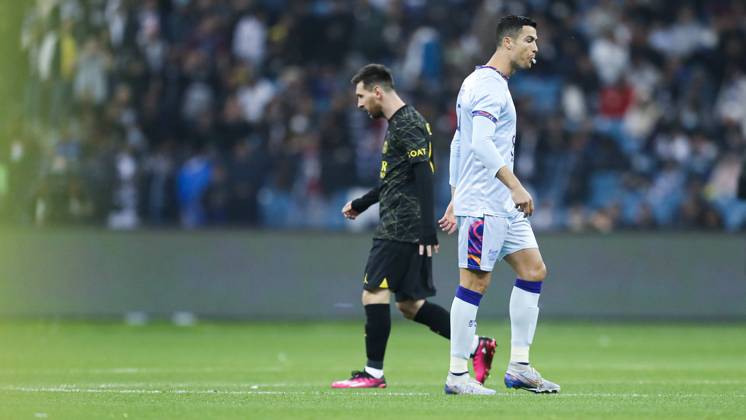 Riyadh All-Star XI vs Paris Saint-Germain FC Cristiano Ronaldo spits as Lionel Messi walks near during the Riyadh All-Star XI vs Paris Saint-Germain FC at King Fahd Stadium on January 19, 2023 in Riyadh, Saudi Arabia. Riyadh King Fahd Stadium Saudi Arabia Copyright: xStringerx 2023.01.19_PSI03235.GS.WEST_HOA_001728