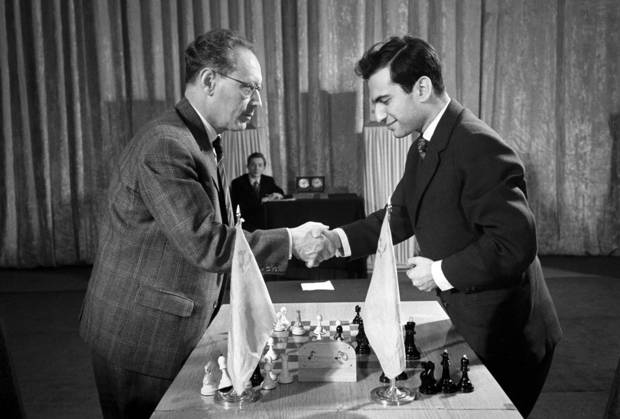 Moscow. The USSR. May 12, 1961. Mikhail Tal (R), a Soviet chess grandmaster, and Mikhail Botvinnik (R), a Soviet chess grandmaster and World Chess Champion, during a rematch at the 1961 World Chess Championship. Valentin Mastyukov, Valentin Cheredintsev TASS  1593626