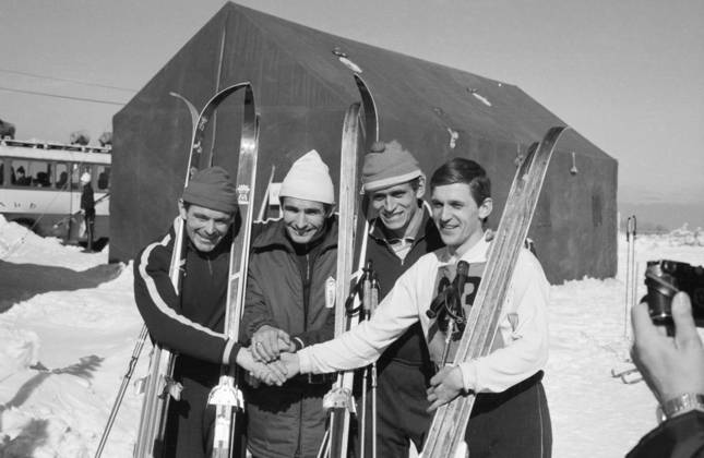Sapporo, Japan. February 8, 1971. Soviet cross-country skiers Vyacheslav Vedenin, Fyodor Simashev, Yuri Skobov and biathlete Alexander Tikhonov (L-R) pose for a photo after competing in the 4x10 kilometre relay cross-country skiing event at the 1972 Winter Olympics pre-Olympic week in Sapporo. Gennady Rakhovetsky TASS  32431417