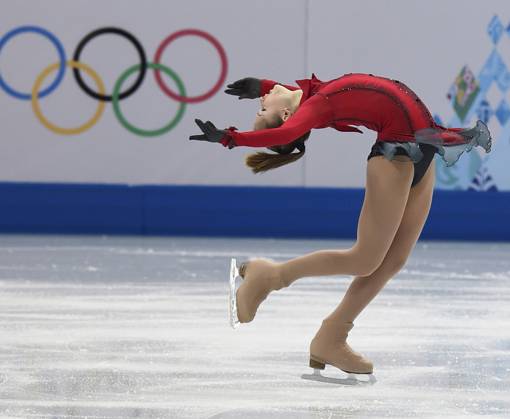 Sochi, Krasnodar Region, Russia. Russian athlete Yulia Lipnitskaya performs with the free skating programme of the women s single event during the 2014 Winter Olympics. Robert Maximov TASS  58123821