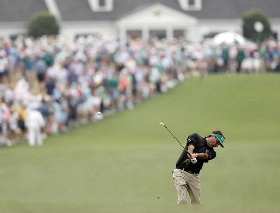 Bubba Watson follows through on a fairway shot during the first round at the Masters tournament at Augusta National Golf Club in Augusta, Georgia on Thursday, April 6, 2023.  AUG20230406201 JOHNxANGELILLO