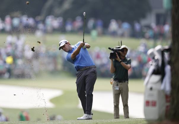 Patrick Cantlay hits approach shot to first green during the first round at the Masters tournament at Augusta National Golf Club in Augusta, Georgia on Thursday, April 6, 2023.  AUG20230406244 JOHNxANGELILLO