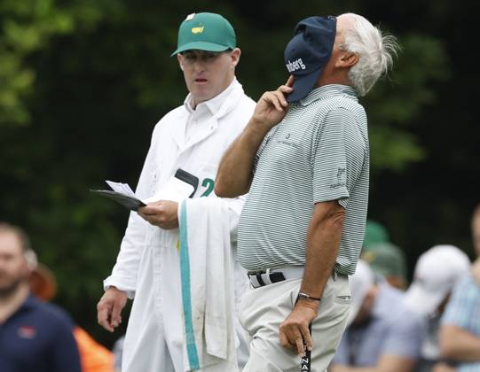 Fred Couples reacts during the first round next to his caddie George Downing at the Masters tournament at Augusta National Golf Club in Augusta, Georgia on Thursday, April 6, 2023.  AUG20230406258 JOHNxANGELILLO