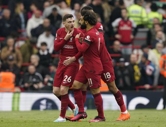 Liverpool, England, 9th April 2023. Andrew Robertson of Liverpool is held back by Mohamed Salah of Liverpool at half timeduring the Premier League match at Anfield, Liverpool. Picture credit should read: Andrew Yates Sportimage EDITORIAL USE ONLY. No use with unauthorised audio, video, data, fixture lists, club league logos or live services. Online in-match use limited to 120 images, no video emulation. No use in betting, games or single club league player publications. SPI-2358-0080