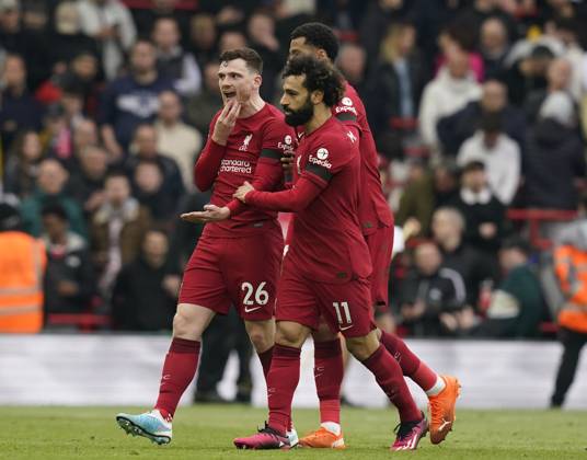 Liverpool, England, 9th April 2023. Andrew Robertson of Liverpool is led away as he claims he was elbowed in the chin by the assistant referee during the Premier League match at Anfield, Liverpool. Picture credit should read: Andrew Yates Sportimage EDITORIAL USE ONLY. No use with unauthorised audio, video, data, fixture lists, club league logos or live services. Online in-match use limited to 120 images, no video emulation. No use in betting, games or single club league player publications. SPI-2358-0083