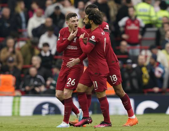 Liverpool, England, 9th April 2023. Andrew Robertson of Liverpool is led away as he claims he was elbowed in the chin by the assistant referee during the Premier League match at Anfield, Liverpool. Picture credit should read: Andrew Yates Sportimage EDITORIAL USE ONLY. No use with unauthorised audio, video, data, fixture lists, club league logos or live services. Online in-match use limited to 120 images, no video emulation. No use in betting, games or single club league player publications. SPI-2358-0084