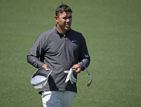 Leader Brooks Koepka walks to the 2nd green during the final round at the 87th Masters tournament at Augusta National Golf Club in Augusta, Georgia on Sunday, April 9, 2023.  AUG20230409223 BOBxSTRONG