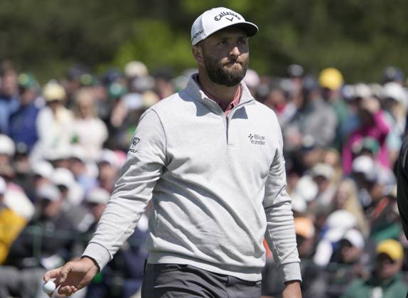 Jon Rahm reacts after settling for par on the 2nd hole during the final round at the 87th Masters tournament at Augusta National Golf Club in Augusta, Georgia on Sunday, April 9, 2023.  AUG20230409227 BOBxSTRONG