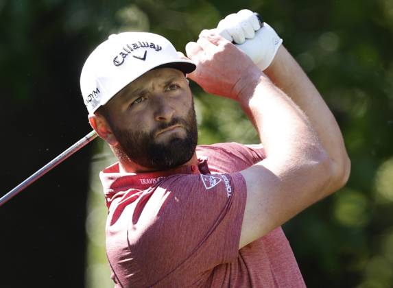 Leader Jon Rahm watches his drive on the 7th hole during the final round at the 87th Masters tournament at Augusta National Golf Club in Augusta, Georgia on Sunday, April 9, 2023.  AUG20230409236 JOHNxANGELILLO