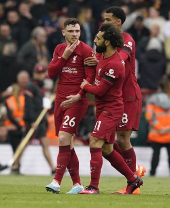 Liverpool, England, 9th April 2023. Andrew Robertson of Liverpool is held back by Mohamed Salah of Liverpool at half time after being struck by the linesman during the Premier League match at Anfield, Liverpool. Picture credit should read: Andrew Yates Sportimage EDITORIAL USE ONLY. No use with unauthorised audio, video, data, fixture lists, club league logos or live services. Online in-match use limited to 120 images, no video emulation. No use in betting, games or single club league player publications. SPI-2358-0172