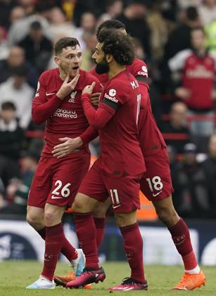 Liverpool, England, 9th April 2023. Andrew Robertson of Liverpool is held back by Mohamed Salah of Liverpool at half time after being struck by the linesman during the Premier League match at Anfield, Liverpool. Picture credit should read: Andrew Yates Sportimage EDITORIAL USE ONLY. No use with unauthorised audio, video, data, fixture lists, club league logos or live services. Online in-match use limited to 120 images, no video emulation. No use in betting, games or single club league player publications. SPI-2358-0173