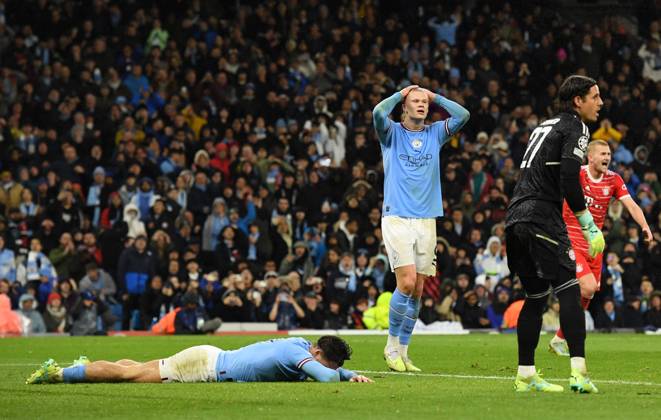 Manchester, England, 11th April 2023. Jack Grealish of Manchester City and Erling Haaland of Manchester City react to a missed opportunity during the UEFA Champions League match at the Etihad Stadium, Manchester. Picture credit should read: Gary Oakley Sportimage EDITORIAL USE ONLY. No use with unauthorised audio, video, data, fixture lists, club league logos or live services. Online in-match use limited to 120 images, no video emulation. No use in betting, games or single club league player publications. SPI-2360-0053