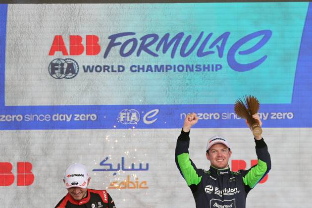 Winner Nick Cassidy NZL Envision cheering with Pkal on the podium, Race 2, Formula E FIA World Championship, Berlin E Prix, 23 04 2023, Tempelhof, Germany