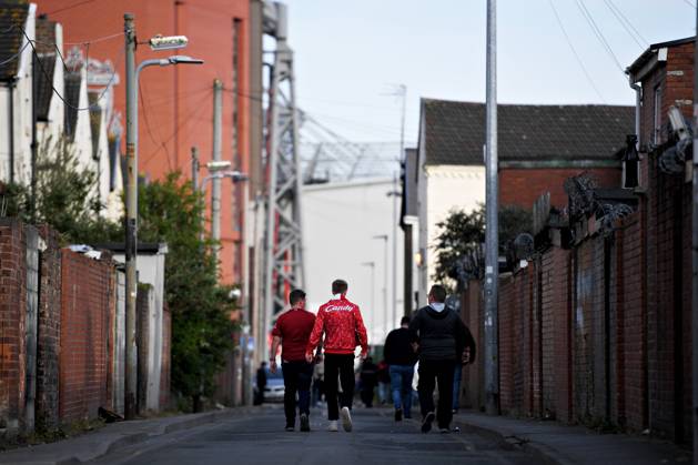 Liverpool, England, 3rd May 2023. Fans gather outside Anfield ahead of the Premier League match at Anfield, Liverpool. Picture credit should read: Gary Oakley Sportimage EDITORIAL USE ONLY. No use with unauthorised audio, video, data, fixture lists, club league logos or live services. Online in-match use limited to 120 images, no video emulation. No use in betting, games or single club league player publications. SPI-2418-0004