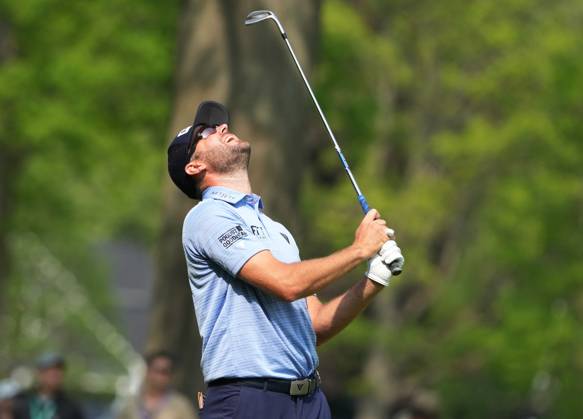 Corey Conners of Canada reacts after hitting into a bunker on the 8th hole during the final round of the 2023 PGA, Golf Herren Championship at Oak Hill Country Club in Rochester, New York on Sunday, May 21, 2023.  ROC20230521532 AARONxJOSEFCZYK