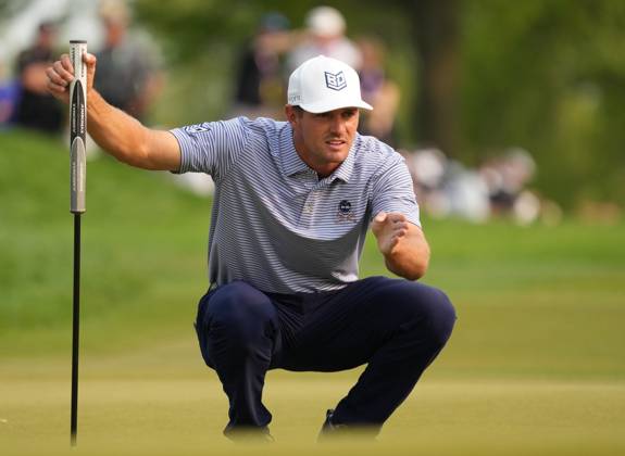 Bryson DeChambeau lines up his putt on the 17th green during the 2023 PGA, Golf Herren Championship at Oak Hill Country Club in Rochester, New York on Sunday, May 21, 2023. Brooks Koepka won the championship shooting 72, 66, 66 and 67 to finish at nine-under-par.  ROC20230521574 AARONxJOSEFCZYK