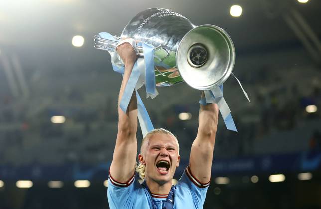 Mandatory Credit: Photo by Kieran McManus Shutterstock (13949252ec) Erling Haaland of Manchester City celebrates with the trophy. Manchester City v Inter Milan, UEFA Champions League, Final, Football, Ataturk Stadium, Istanbul, Turkey - 10 Jun 2023 EDITORIAL USE ONLY No use with unauthorised audio, video, data, fixture lists, club league logos or live services. Online in-match use limited to 120 images, no video emulation. No use in betting, games or single club league player publications. Manchester City v Inter Milan, UEFA Champions League, Final, Football, Ataturk Stadium, Istanbul, Turkey - 10 Jun 2023 EDITORIAL USE ONLY No use with unauthorised audio, video, data, fixture lists, club league logos or live services. Online in-match use limited to 120 images, no video emulation. No use in betting, games or single club league player publications. Copyright: xKieranxMcManus Shutterstockx 13949252ec