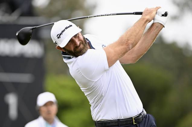 Dustin Johnson hits from the 18th tee during the first round of the 2023 U.S. Open at the Los Angeles Country Club in Los Angeles on Thursday, June 15, 2023. McIlroy finished with a five-under par 65.  LAP20230615233 ALEXxGALLARDO