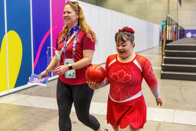 June 18, 2023, Berlin, Germany: An athlete from Canada walks with her coach after competition in Rhythmic gymnastics, Rhythmische Sportgymnastik, RSG discipline during the Special Olympics Summer World Games Berlin 2023 in Messe conference centre. The 2023 Berlin Games will host 7000 athletes with learning disabilities from 190 countries. Special Olympics is an international charity which aims to include individuals with learning disabilities into the realm of olympic sports. Berlin 2023 is the biggest sporting as well as charitable event of 2023. Berlin Germany - ZUMAs197 20230618_zaa_s197_128 Copyright: xDominikaxZarzyckax