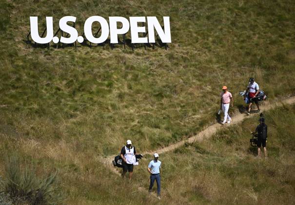 Wyndham Clark and Rickie Fowler make their way to the fourth green during the final round of the 2023 U.S. Open Golf Championship at the Los Angeles Country Club in Los Angeles, California on Sunday, June 18, 2023.  LAP20230618756 ALEXxGALLARDO