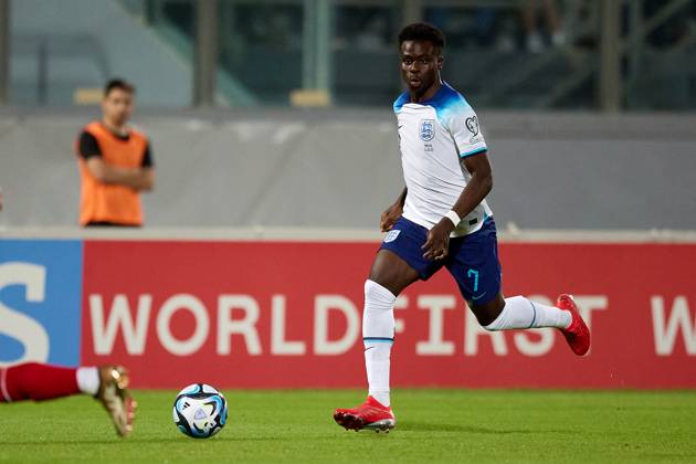 TA™ QALI, MALTA - JUNE 16: England national soccer team player Bukayo Saka runs with the ball during the UEFA EURO, EM, Europameisterschaft,Fussball 2024 European qualifying soccer match between Malta and England at the National Stadium, Ta™ Qali, Malta, on 16 June 2023. Malta v England - UEFA EURO 2024 European Qualifier