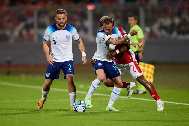 TA™ QALI, MALTA - JUNE 16: England national soccer team player James Maddison (C) vies for the ball with Joseph Mbong (R) of Malta during the UEFA EURO, EM, Europameisterschaft,Fussball 2024 European qualifying soccer match between Malta and England at the National Stadium, Ta™ Qali, Malta, on 16 June 2023. Malta v England - UEFA EURO 2024 European Qualifier
