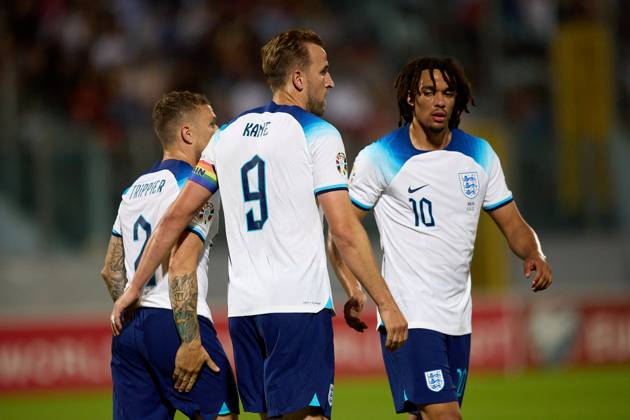 TA™ QALI, MALTA - JUNE 16: England national soccer team captain Harry Kane (C) celebrates scoring a penalty with Kierran Trippier (L) and Tent Alexander-Arnold (R) during the UEFA EURO, EM, Europameisterschaft,Fussball 2024 European qualifying soccer match between Malta and England at the National Stadium, Ta™ Qali, Malta, on 16 June 2023. Malta v England - UEFA EURO 2024 European Qualifier