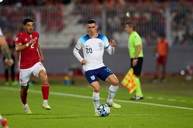 TA™ QALI, MALTA - JUNE 16: England national soccer team player Phil Foden passes the ball during the UEFA EURO, EM, Europameisterschaft,Fussball 2024 European qualifying soccer match between Malta and England at the National Stadium, Ta™ Qali, Malta, on 16 June 2023. Malta v England - UEFA EURO 2024 European Qualifier