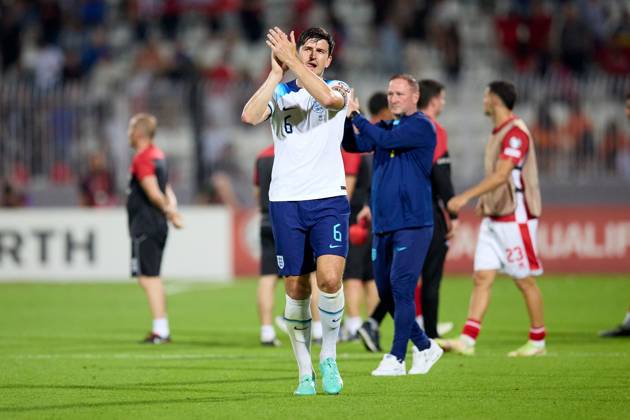 TA™ QALI, MALTA - JUNE 16: England national soccer team player Harry Maguire salutes the England fans (not in picture) after the UEFA EURO, EM, Europameisterschaft,Fussball 2024 European qualifying soccer match between Malta and England at the National Stadium, Ta™ Qali, Malta, on 16 June 2023. Malta v England - UEFA EURO 2024 European Qualifier