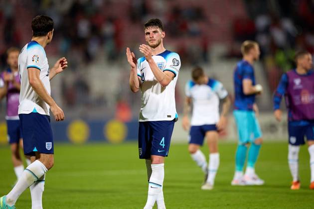 TA™ QALI, MALTA - JUNE 16: England national soccer team player Declan Rice salutes the England fans (not in picture) after the UEFA EURO, EM, Europameisterschaft,Fussball 2024 European qualifying soccer match between Malta and England at the National Stadium, Ta™ Qali, Malta, on 16 June 2023. Malta v England - UEFA EURO 2024 European Qualifier